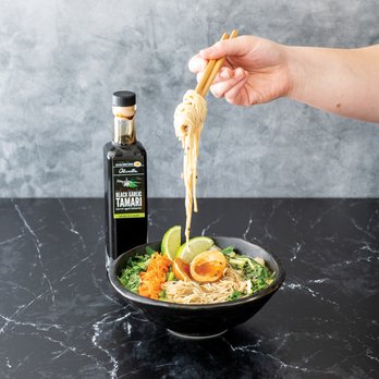 Robust Gourmet Kitchen Store - a person holding chopsticks over a bowl of noodles - Olive Oil Near Me - Lake Saint Louis, Missouri Robust Gourmet Kitchen Store - a person holding chopsticks over a bowl of noodles - Olive Oil Near Me - Lake Saint Louis, Missouri