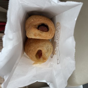 Grand Donuts - A croissant with ham and cheese and another one with jalapeño sausage. - Donuts Near Me - San Antonio, Texas