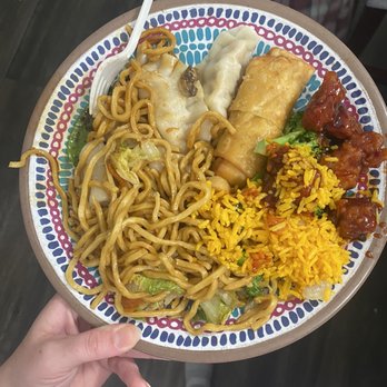 Chang Jiang Chinese Kitchen - a person holding a plate of food - Chinese Near Me - DeForest, Wisconsin Chang Jiang Chinese Kitchen - a person holding a plate of food - Chinese Near Me - DeForest, Wisconsin
