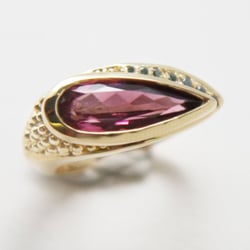 Bertoni Gallery - Pink tourmaline gold ring with blue diamond. Amethyst version sterling silver is being featured in 2014 movie "Helicopter Mom"