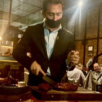 Brick - Santiago fixing up our dinner. - Steakhouses Near Me - Guadalajara, JAL
