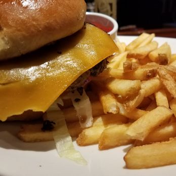 Outback Steakhouse - Solid Grass-fed Premium Burger & Sharp Cheddar. - Steakhouses Near Me - Sebring, Florida Outback Steakhouse - Solid Grass-fed Premium Burger & Sharp Cheddar. - Steakhouses Near Me - Sebring, Florida