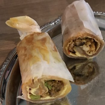 Calcutta Cricket Club - Kati Rolls - half of a chicken with egg, half with a lamb with egg. - Indian Near Me - Calgary, Alberta Calcutta Cricket Club - Kati Rolls - half of a chicken with egg, half with a lamb with egg. - Indian Near Me - Calgary, Alberta