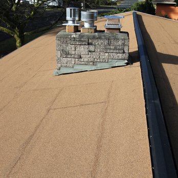 Addicott Roofing - CertainTeed granulated torchdown installed by Addicott. The black metal is a continuous vented ridge allowing proper attic airflow. - Roofing Near Me - Edmonds, Washington Addicott Roofing - CertainTeed granulated torchdown installed by Addicott. The black metal is a continuous vented ridge allowing proper attic airflow. - Roofing Near Me - Edmonds, Washington