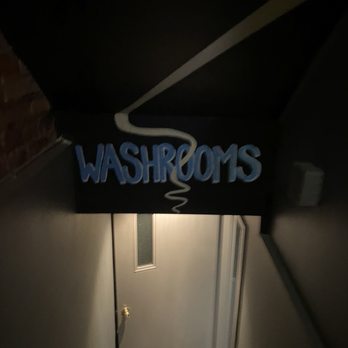 Hey Lucy - the entrance to a washroom - Pizza Near Me - Toronto, Ontario