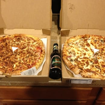 Jet City Pizza - Two large two toppings, side by side! Not many toppings and dough was not cooked through on either pizza!!! - Pizza Near Me - Marysville, Washington Jet City Pizza - Two large two toppings, side by side! Not many toppings and dough was not cooked through on either pizza!!! - Pizza Near Me - Marysville, Washington