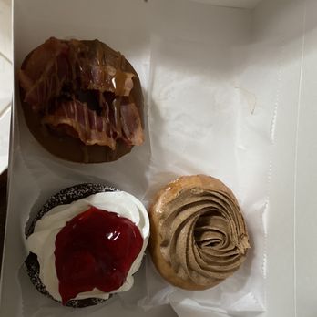 Doughology - Lynbrook - Maple bacon, strawberry chocolate cheesecake donut and cinnamon bun donut - Donuts Near Me - Lynbrook, New York Doughology - Lynbrook - Maple bacon, strawberry chocolate cheesecake donut and cinnamon bun donut - Donuts Near Me - Lynbrook, New York