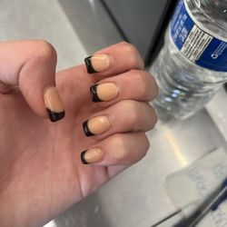 I wanted black french tips. i asked for a pinkish nude for the base color. the tip turned out good but the vase color is very orange. $65