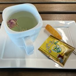 Tea at the cafe (rosebud water with rosebud, saffron rock candy was such a nice presentation) Tea at the cafe (rosebud water with rosebud, saffron rock candy was such a nice presentation)