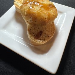 Theatre Cafe - Fried cheese spread with hot honey on a toasted baguette