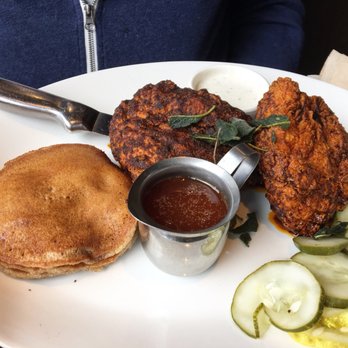 Yard House - Nashville hot chicken with sweet potato pancakes and orange syrup - Bars Near Me - Westlake, Ohio Yard House - Nashville hot chicken with sweet potato pancakes and orange syrup - Bars Near Me - Westlake, Ohio