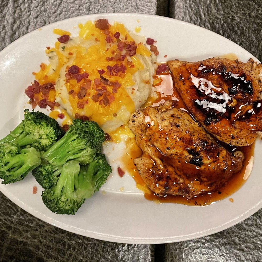 Ruby Tuesday - Hickory Bourbon Chicken: Grilled chicken breasts topped w/ hickory bourbon glaze, broccoli & loaded mashed potatoes. - American Near Me - Statesboro, Georgia Ruby Tuesday - Hickory Bourbon Chicken: Grilled chicken breasts topped w/ hickory bourbon glaze, broccoli & loaded mashed potatoes. - American Near Me - Statesboro, Georgia
