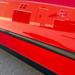 Carisma Customs - This is the reflection on the side of the car.