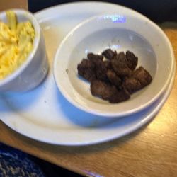 Texas Roadhouse - Burnt kids steak bites (ordered them medium)