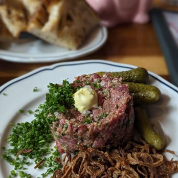 Fete - Beef tare-tare with pickles, chives and fried onion. Best to mix it together before eating :) - New American Near Me - Honolulu, Hawaii Fete - Beef tare-tare with pickles, chives and fried onion. Best to mix it together before eating :) - New American Near Me - Honolulu, Hawaii