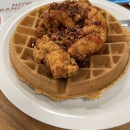 Tyson frozen chicken tenders on a cardboard waffle. Tyson frozen chicken tenders on a cardboard waffle.