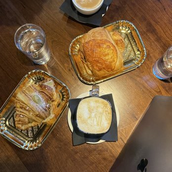 Florentine Cafe - (Left to right) Pistachio croissant, cappuccino, ham & cheese, honey latte - Cafes Near Me - Las Vegas, Nevada