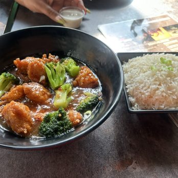 Tinjune Downtown - General Tso Chicken with white rice - Asian Fusion Near Me - Newark, New Jersey