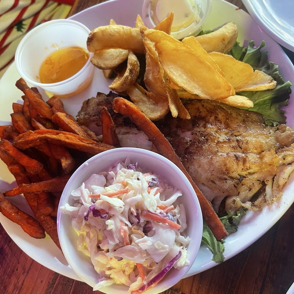 Cracklin' Jack's - Broiled halibut with cole slaw and vittles - Seafood Near Me - Naples, Florida Cracklin' Jack's - Broiled halibut with cole slaw and vittles - Seafood Near Me - Naples, Florida