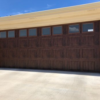 Killeen Overhead Doors - 18x7 Clopay Gallery style garage door in Walnut Oak finish - Garage Door Services Near Me - Killeen, Texas