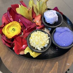 Lavender, scrub and beautiful flowers that are added to the water for the pedicure