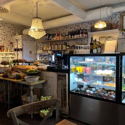 Café Konditori Kringlan - The inside, with the morning buffet of fruits and jams and break and pastries. Olives and fresh cheeses. Smoothies and espresso.