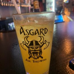 a glass with a drink in it
