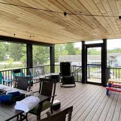 Premier Building Group - Interior of the Screened in Deck. Pine Tongue and Groove Ceiling , Tru North Deck boards