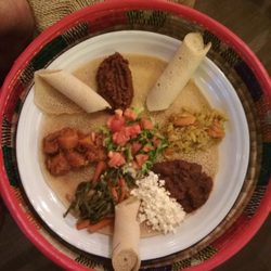 Taitu - Cena para dos. Platos de ternera y de lentejas con sus correspondientes acompañamientos