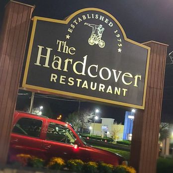 The Hardcover Restaurant - Look for this sign if you're trying to make it here, as you'll see in the next picture, the building is pretty, but not very noticable. - Steakhouses Near Me - Danvers, Massachusetts The Hardcover Restaurant - Look for this sign if you're trying to make it here, as you'll see in the next picture, the building is pretty, but not very noticable. - Steakhouses Near Me - Danvers, Massachusetts