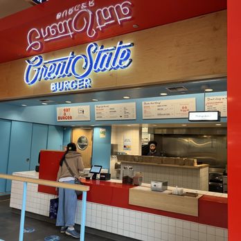 Great State Burger - a woman standing at the counter - Fast Food Near Me - Bellevue, Washington