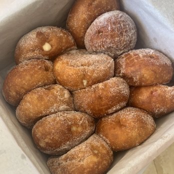 Leonard's Bakery - A dozen malasada puffs - Bakeries Near Me - Honolulu, Hawaii Leonard's Bakery - A dozen malasada puffs - Bakeries Near Me - Honolulu, Hawaii