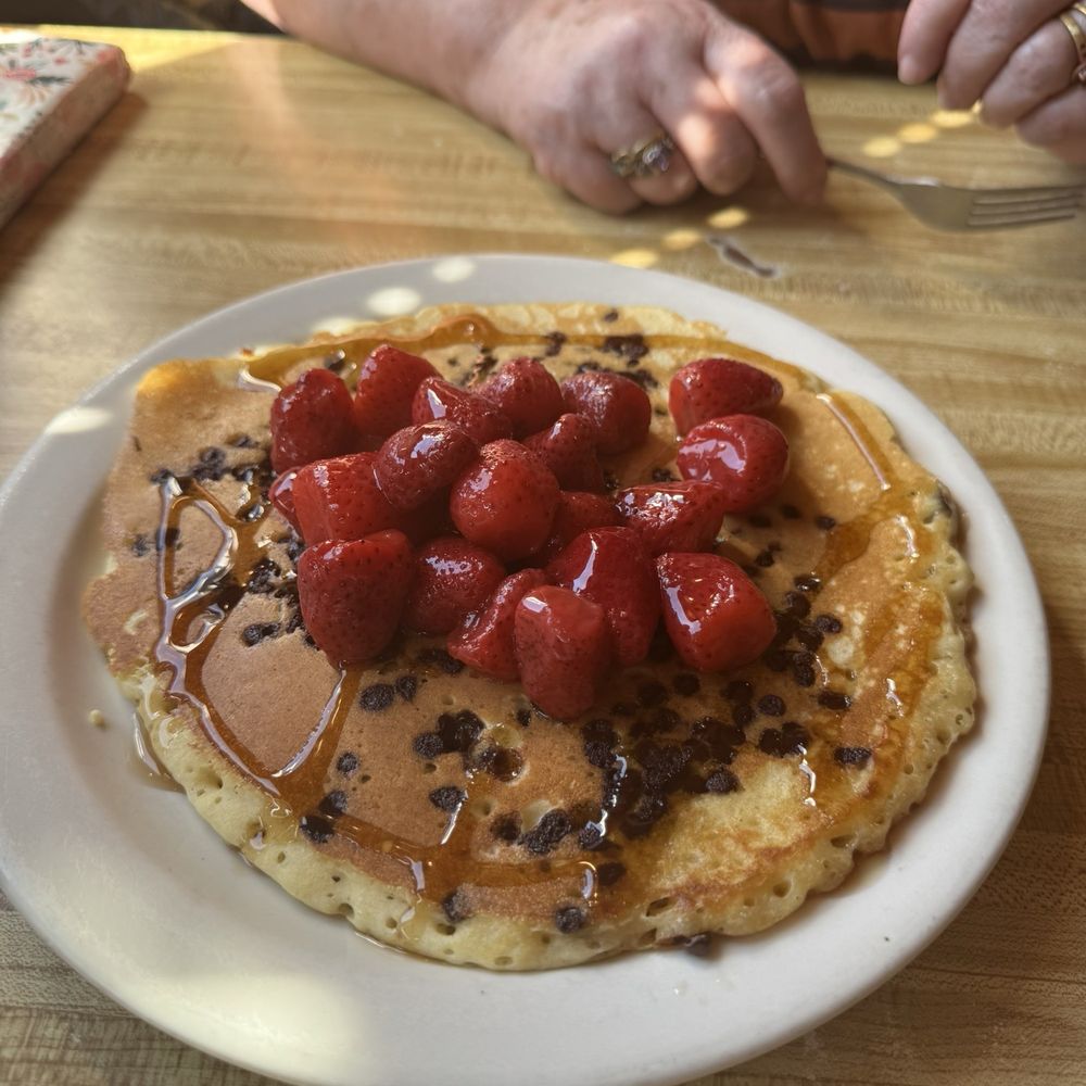 Chocolate chip pancakes with strawberries