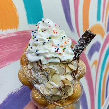 Double Three - Waffle cone with vanilla ice cream, almonds, kitkat, whip cream and pretty sprinkles. Delicious and Pretty! - Ice Cream & Frozen Yogurt Near Me - Honolulu, Hawaii Double Three - Waffle cone with vanilla ice cream, almonds, kitkat, whip cream and pretty sprinkles. Delicious and Pretty! - Ice Cream & Frozen Yogurt Near Me - Honolulu, Hawaii