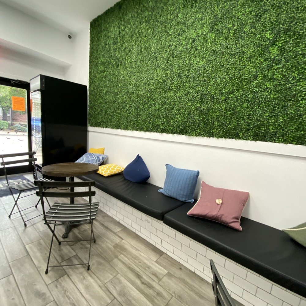 Moksha Café - a seating area in a cafe - Coffee & Tea Near Me - Northport, New York Moksha Café - a seating area in a cafe - Coffee & Tea Near Me - Northport, New York