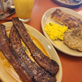 Snooze, an A.M. Eatery - Bacon but different (front) chicken sausage in the back - Breakfast & Brunch Near Me - Austin, Texas