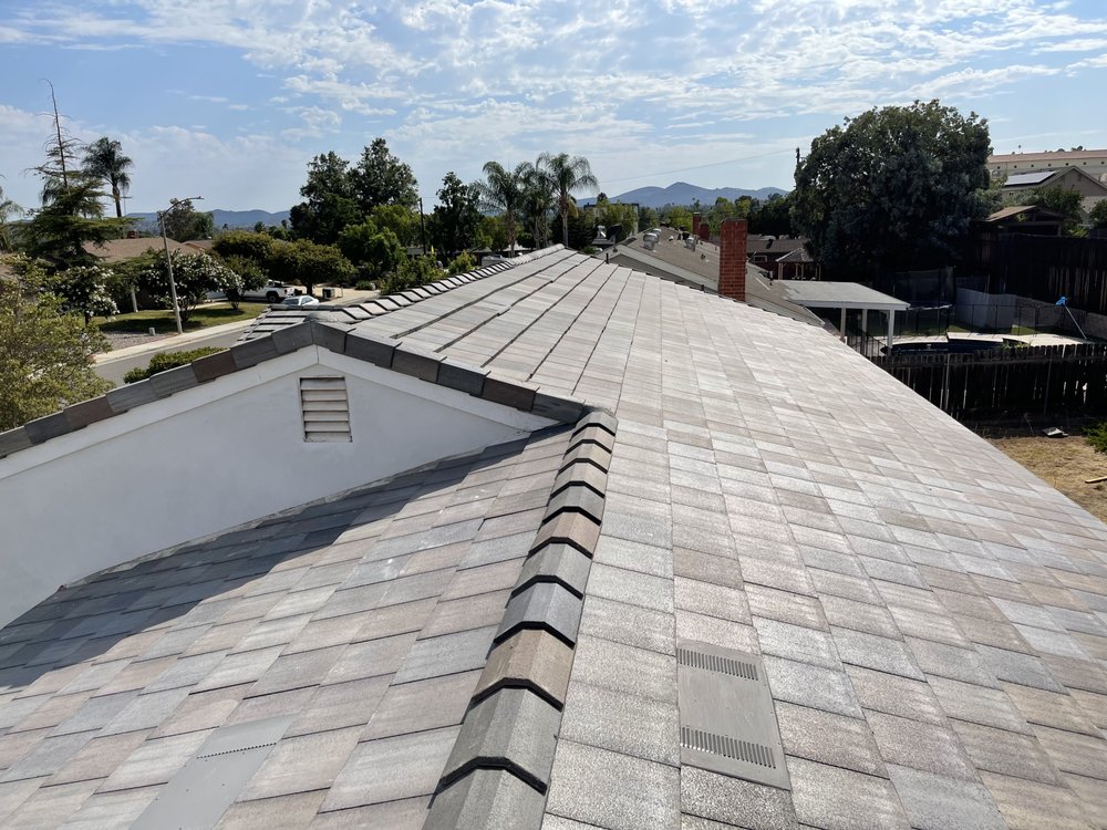 Slide of Venegas Roofing