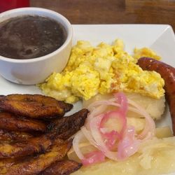 Mi Ranchito - Eggs, black beans, yucca, chorizo, y platinos