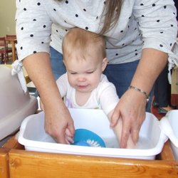 Hill Country Montessori School - Washing dishes