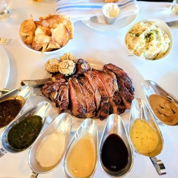 Echo & Rig - 41 oz tomahawk steak with potatoes, all the sauces, chips, and mushrooms. - Steakhouses Near Me - Las Vegas, Nevada