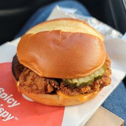 McDonald's - Spicy chicken. It's the sauce that's spicy. From the size of the chicken breast, it was under-aged.