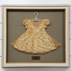 The Framemakers - Antique crochet dress with plaque