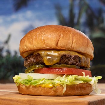 Islands Restaurant - a cheeseburger with lettuce and tomato - Burgers Near Me - Fountain Valley, California Islands Restaurant - a cheeseburger with lettuce and tomato - Burgers Near Me - Fountain Valley, California
