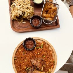 The seasoning house - Incredible Jollof rice dish and African style grill chicken/jerk chicken with plantains