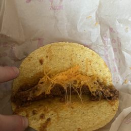 One of four tacos that had nothing but meat and cheese