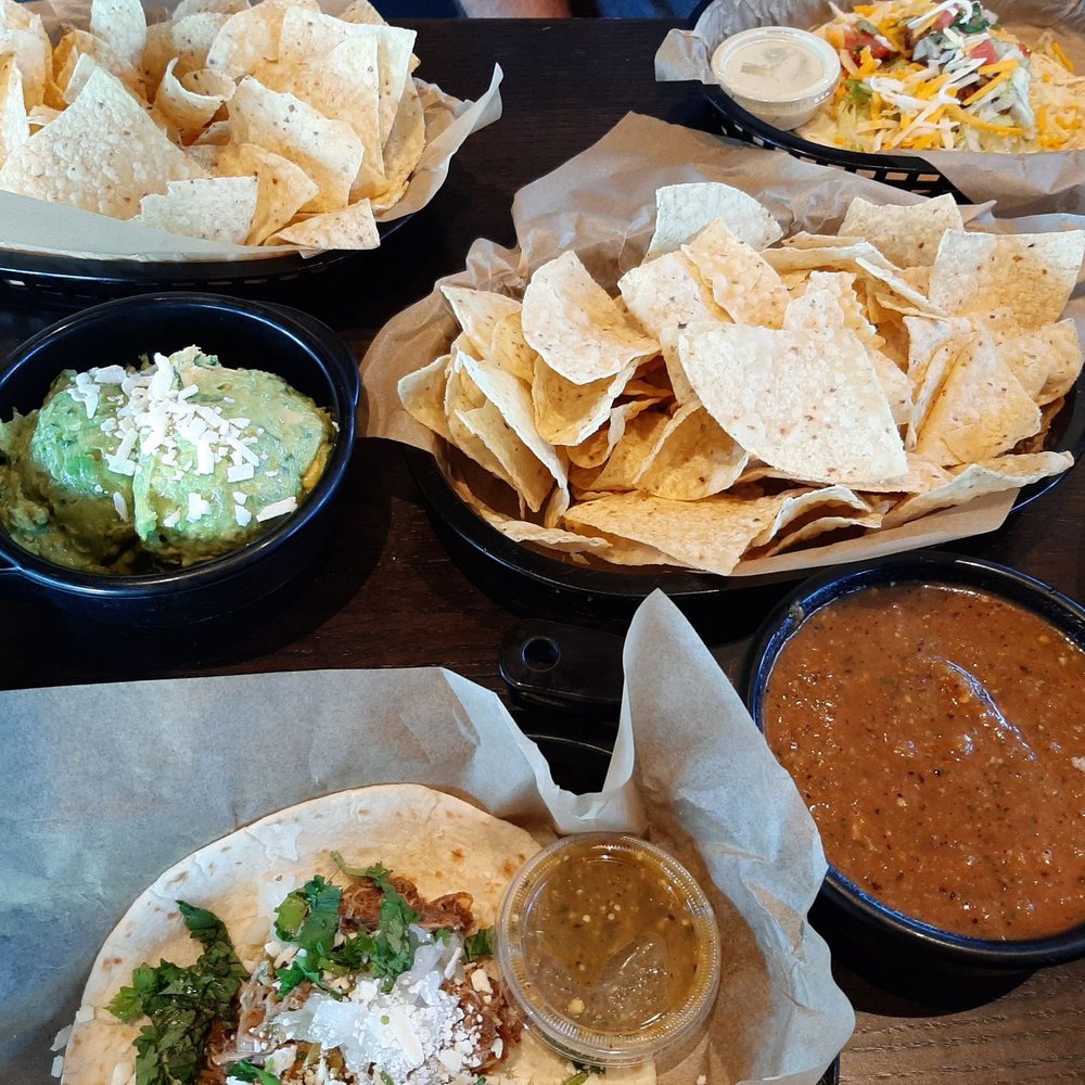 Torchy's Tacos - Chips with salsa and guacamole - Tacos Near Me - Rogers, Arkansas