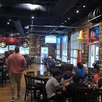 Ford's Garage - Empty tables. 45 minute to an hour wait. What a lazy crew. - Burgers Near Me - Brandon, Florida Ford's Garage - Empty tables. 45 minute to an hour wait. What a lazy crew. - Burgers Near Me - Brandon, Florida