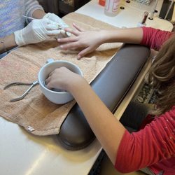 Nail Studio - A daughter getting a manicure.