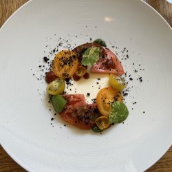 La Veranda - Tomato and mozzarella dish with nasturtiums, pesto, and tomato dollops :)