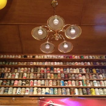 Pat's Downtown Grill - Vintage beer cans lined the bar - American Near Me - Mobile, Alabama Pat's Downtown Grill - Vintage beer cans lined the bar - American Near Me - Mobile, Alabama